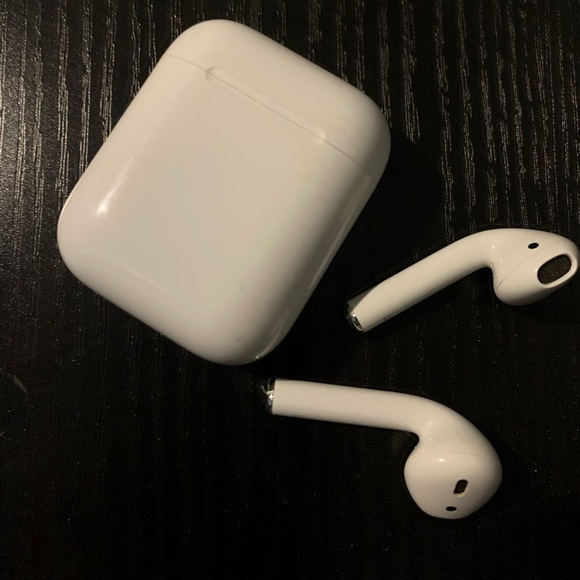 Apple AirPods (2 generation) wireless earbuds.